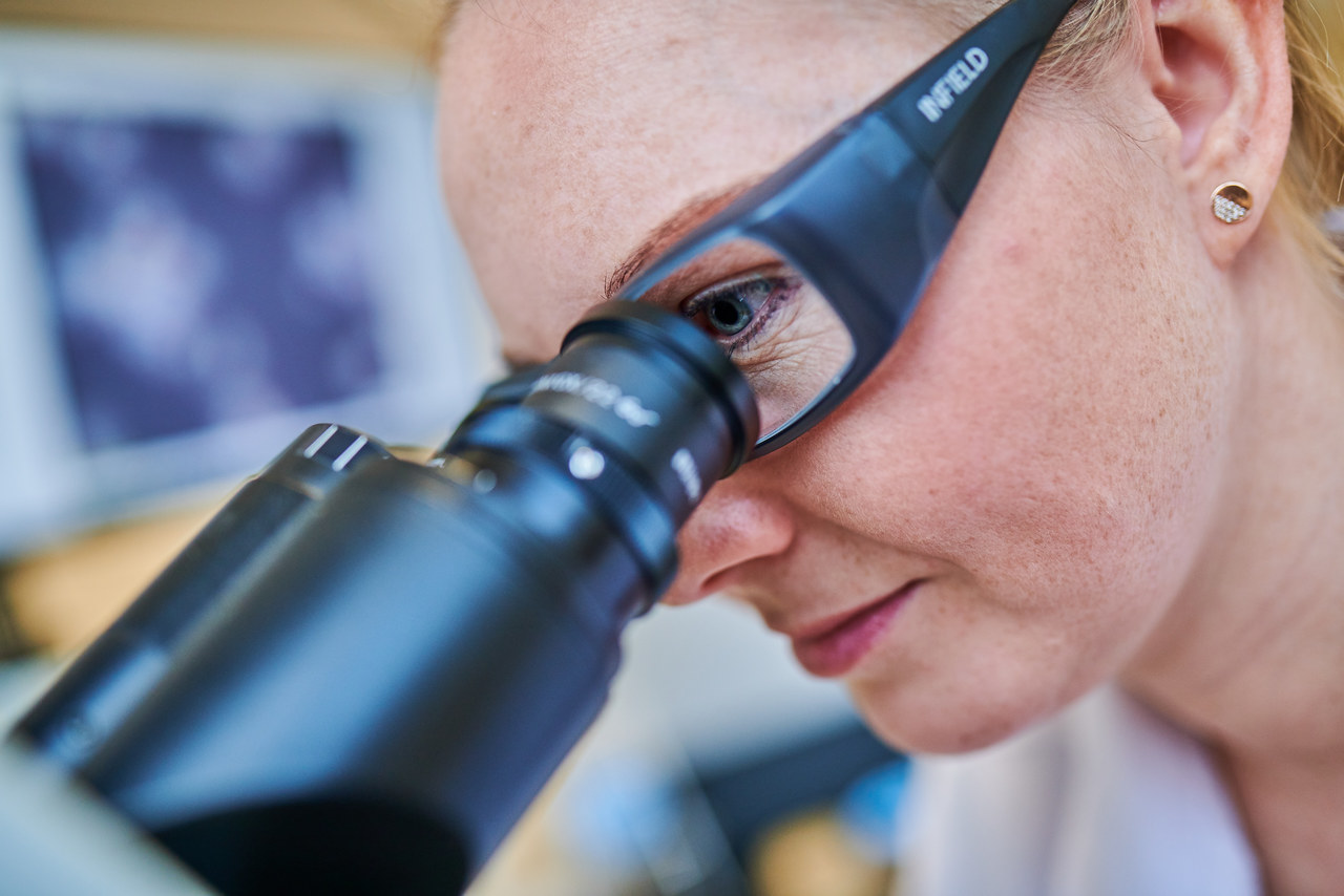 Woman with microscope