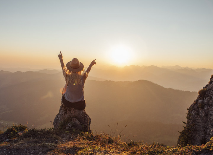 Woman and sunrise