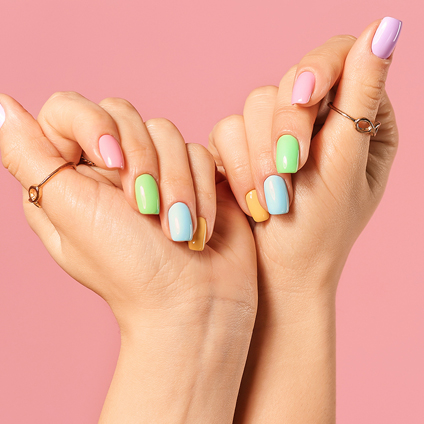 2 hands with nice colored nails