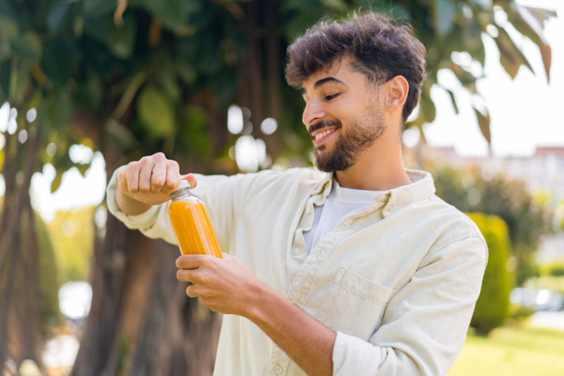 yound man with softdrink