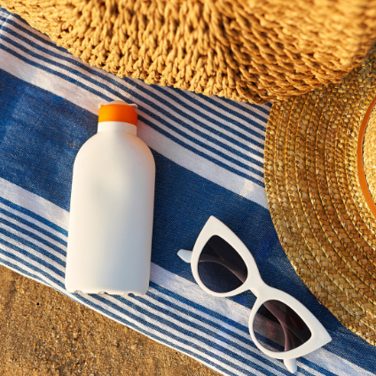 Sunglasses, hat and sunscreen