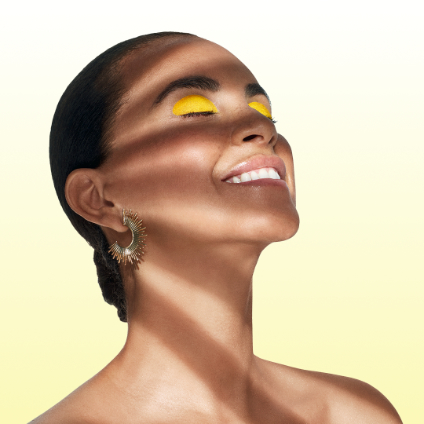 Woman with sunshine in her face
