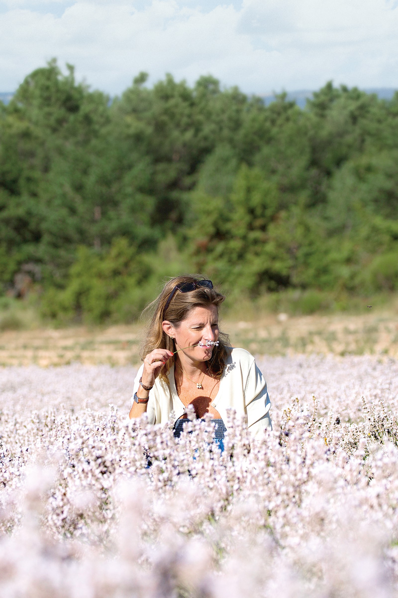 Woman in white lavender field