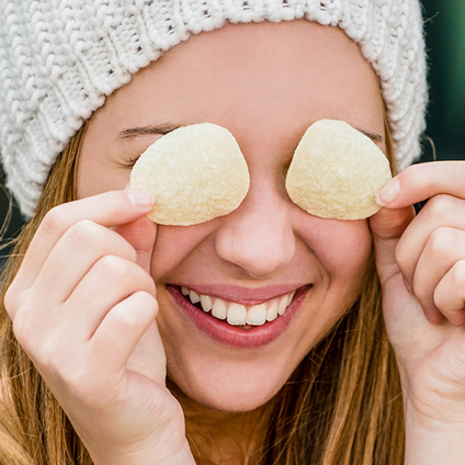 Woman with chips before her eyes